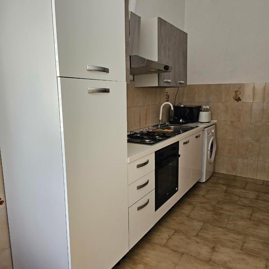 Appartamento A Telti Con Giardino Privato E Posto Auto Exterior foto